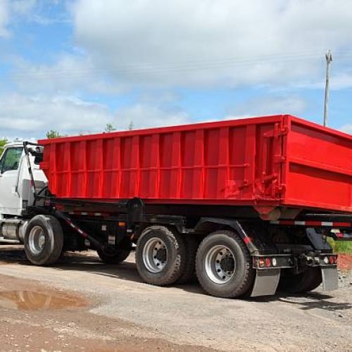 dump truck that can remove its box and it can be used as a dumpster.